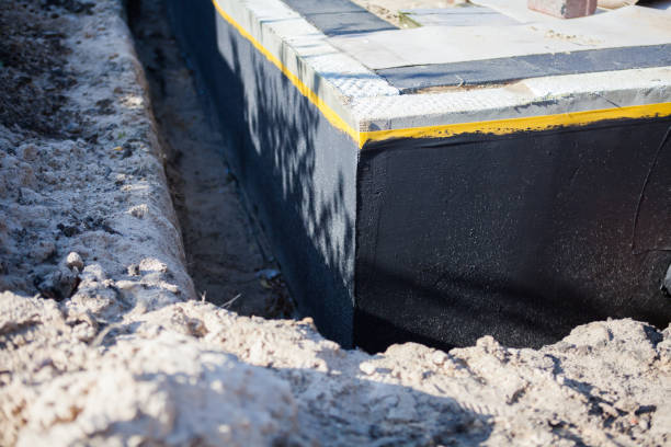 Professional Emergency Waterproofing technician working in Grove City, OH